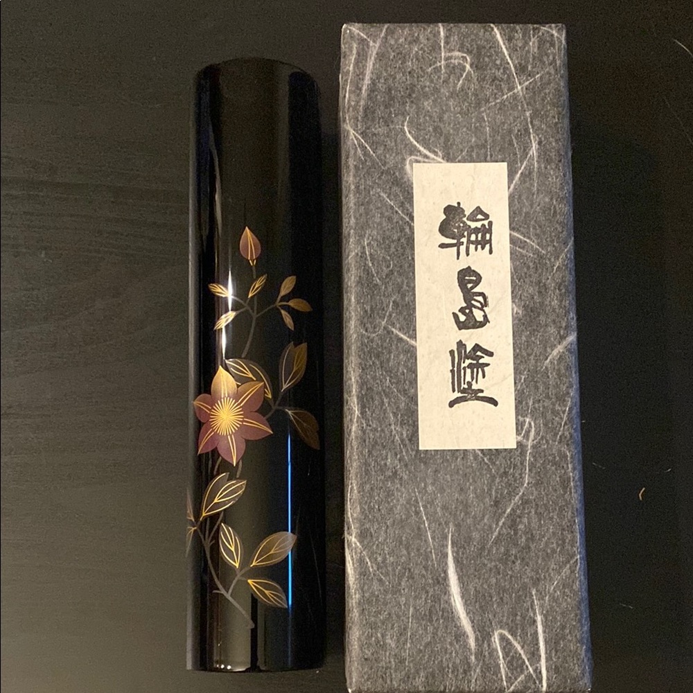 Wajima Elegant Black Vase with Floral Accents